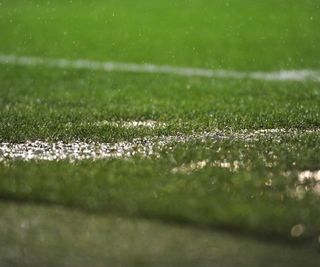 A close up of waterlogged turf